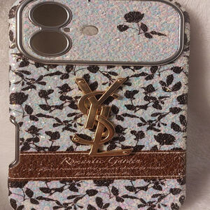 This didn' fit my phone. Maybe Iphone 17? White Floral Glitter Phone Case